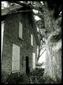 A long ago abandoned farm house lying in ruins.