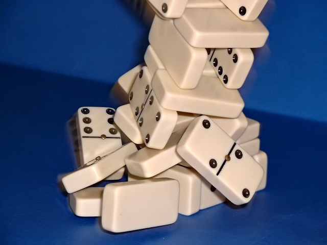 The Tumbling Tower of Dominoes