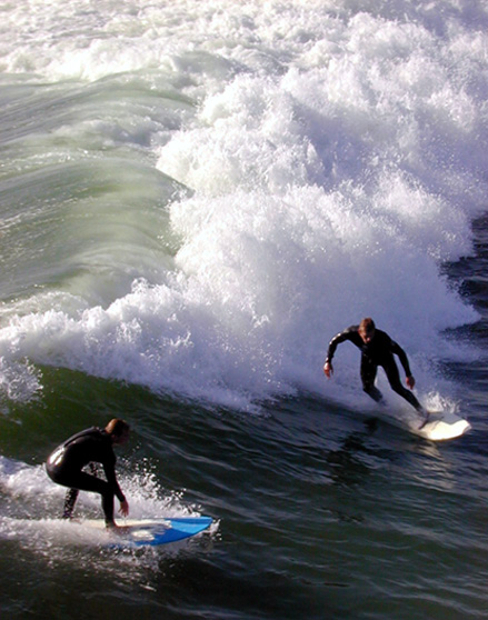 Surfers at Pacific Beach CA