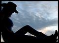 Cowgirl at Sunset