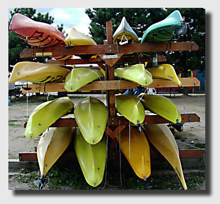 These kayaks are waiting to be taken to the water.