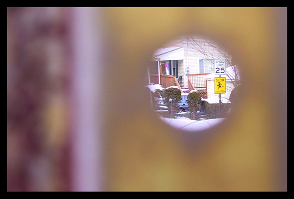 Through the rusty stop-sign pole