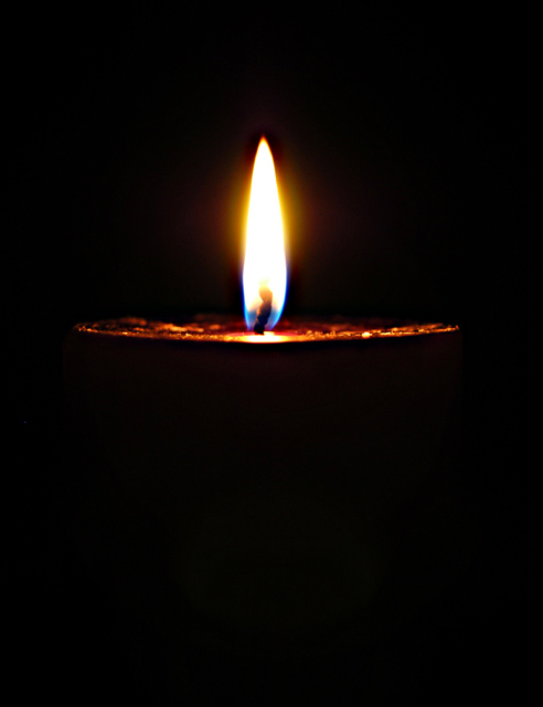 Black wax candle... light