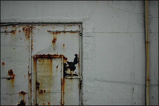 Rusted door inside a rusted door