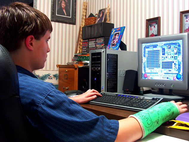 Habitual On Line Gamer - Even with broken wrist.