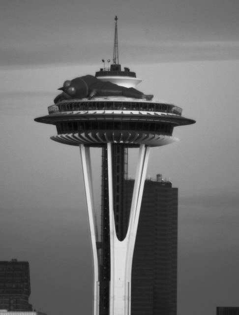 Why is this alien on top of the Space Needle? Story on page B3