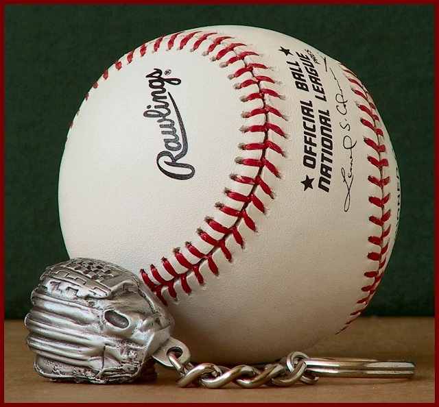miniature glove with full size ball