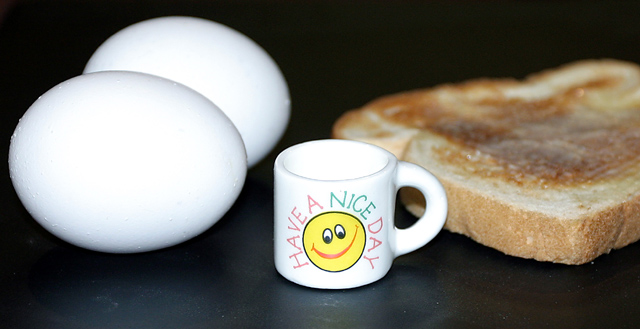 Would you like tea or coffee? with toast and eggs