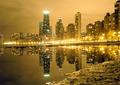 City Reflected in a Puddle