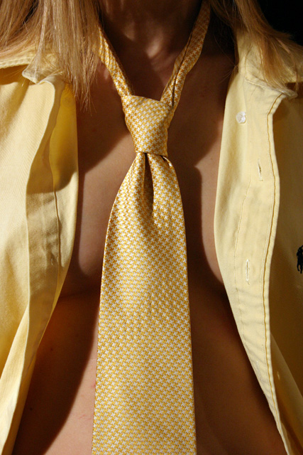 She loves my yellow shirt and tie.