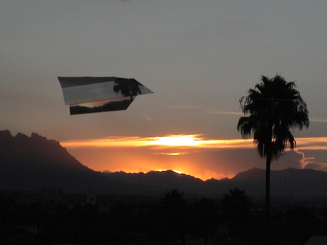 Flying Paper Planes From Grandpa's Roof