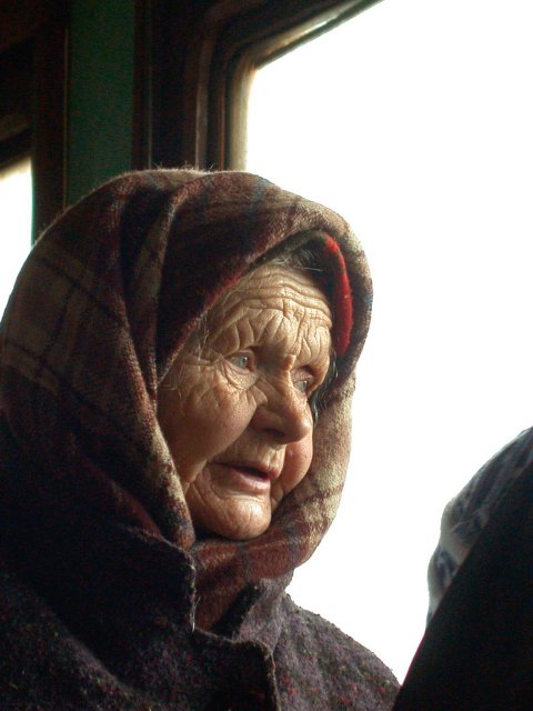 an old woman in the train