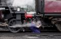 Engine being separated from carriages.