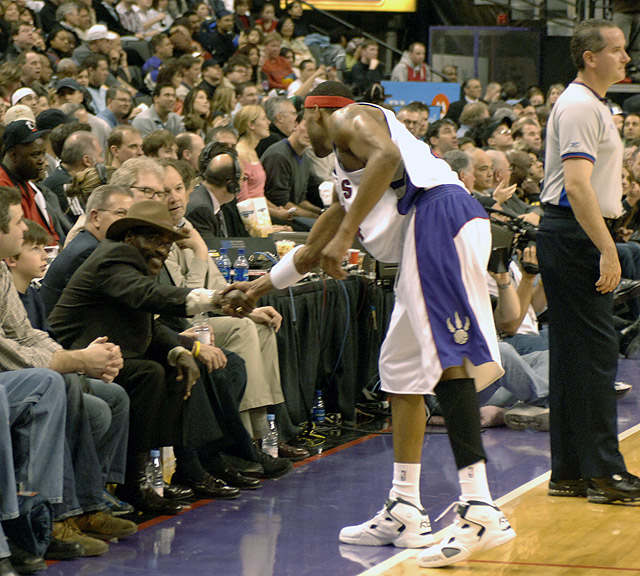 Rubin "Hurricane" Carter greets Toronto Raptors' Maurice Peterson