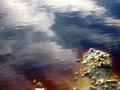 Sky within ferrous waters.
