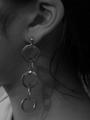 The Girl with the circle earrings