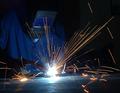 Welding Torch, Helmet, Steel, and Sparks