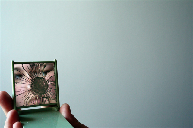 Self Portrait in Compact Mirror