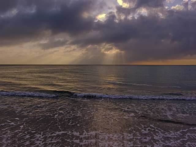 Atlantic Ebb Tide - "plants a kiss on the shore...."