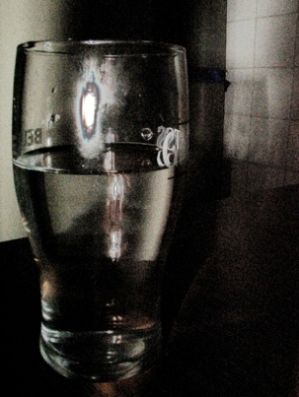 A single half-filled glass, double the medium