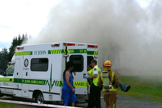 Teenager  and Mother  Rescued as smoke engulfs home