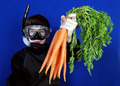 Divers Pushing Carrots