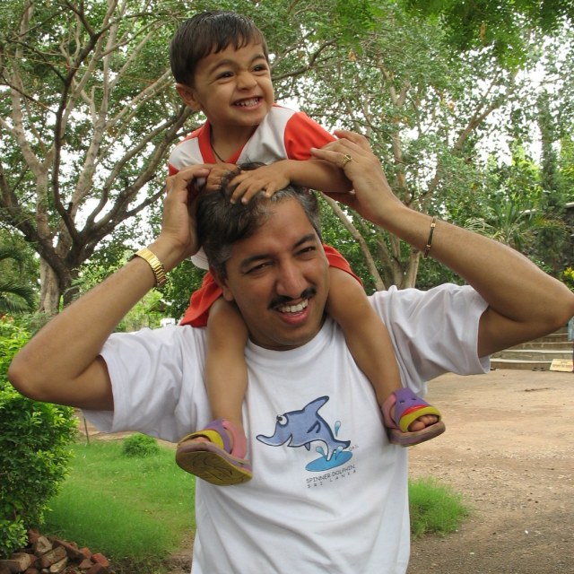 Wow! Pulling dad's hair is such fun!