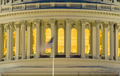 U.S. Capitol with Flag at Dawn