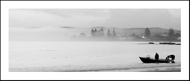 Fishing on a foggy morning