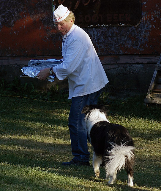 A dog's pleasure - 'Food  . . Hey cook! Come back with that!'