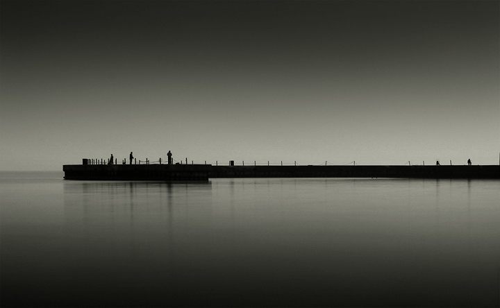 Fishermen at the Breakwater