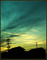 Powerlines against Dark Clouds