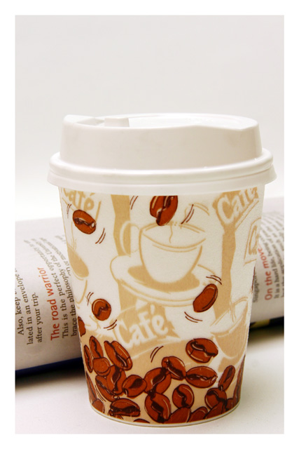 A cup of coffee and the daily press