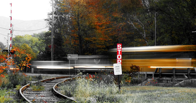 "This vehicle stops at all railroad crossings."