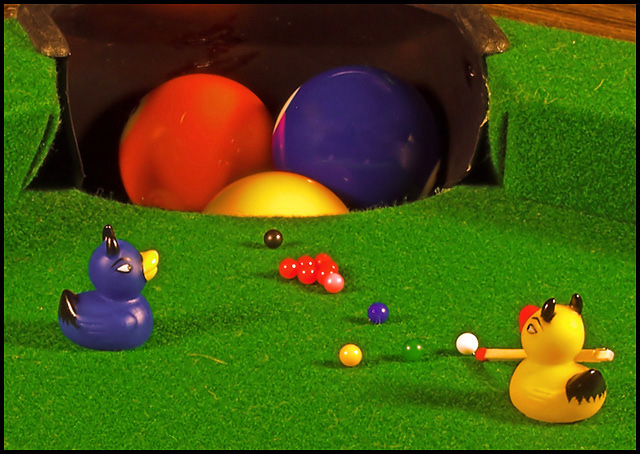 After the pool hall closes two budding snooker stars take to the tables and practice
