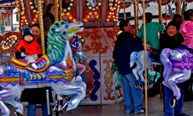 Precious Baby on the Carousel