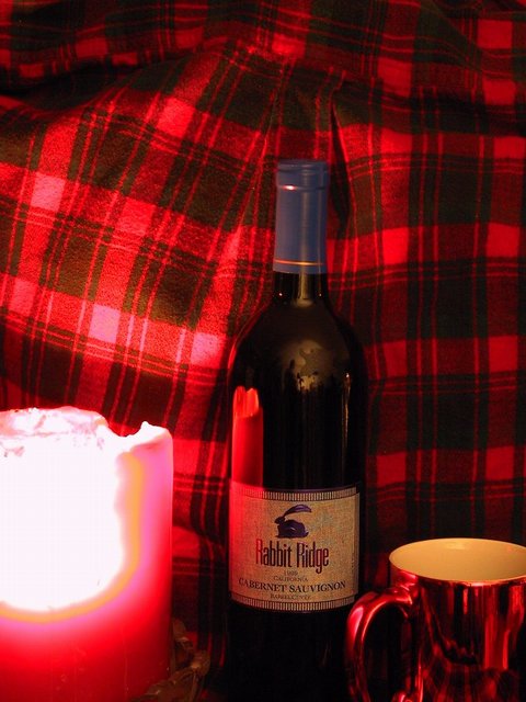 Bottle of Red in Candel Light