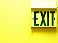 Exit Sign on Yellow Background