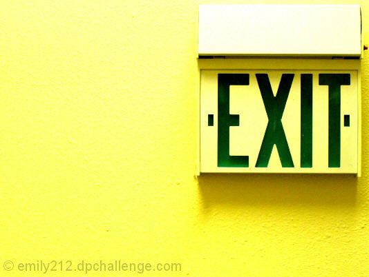 Exit Sign on Yellow Background