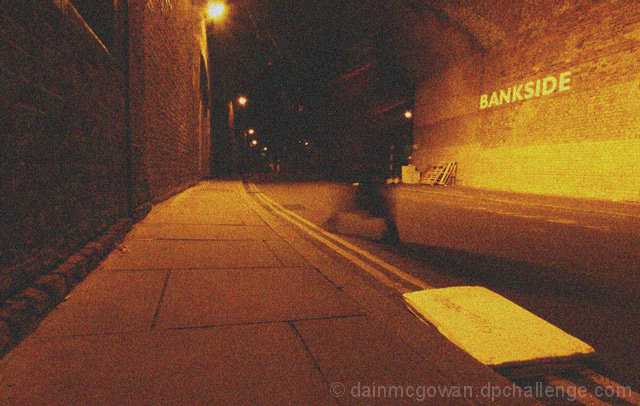 night time stroll under bankside arch