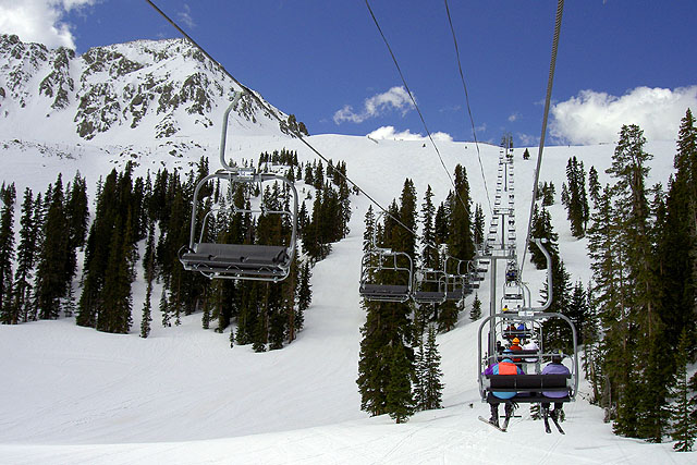 The chairs and people vanish into the sky.