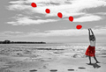 The Girl With The Red Balloons