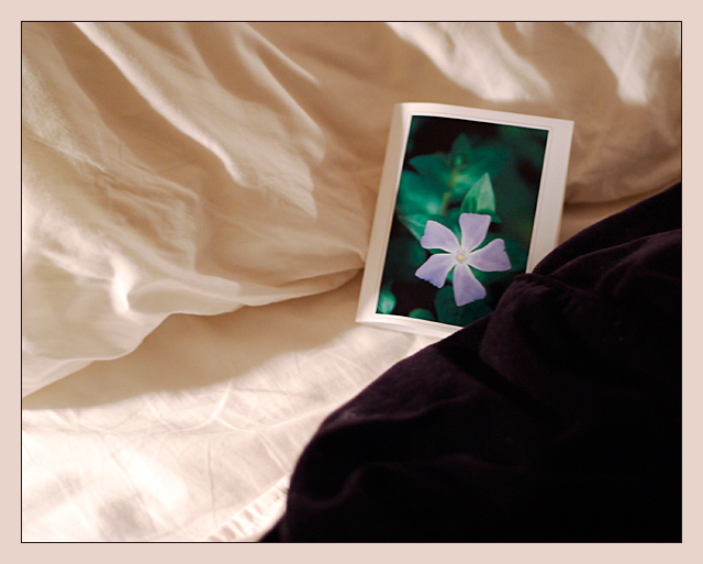 Homemade card, unmade bed