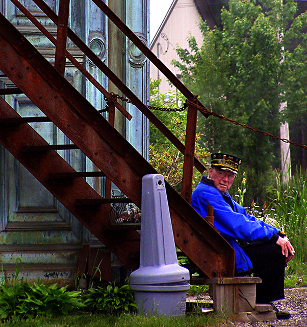 Trolley Conductor on a Cigarette Break