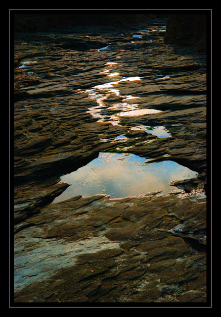 Water drops on burning rocks.