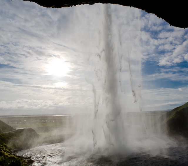 Behind the waterfall