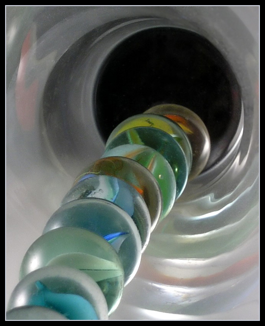 Glassmarbles In A Glass