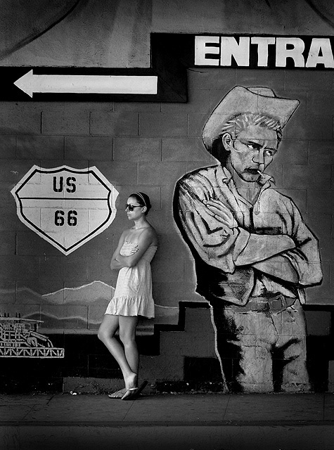 Waiting for a bus with a cowboy