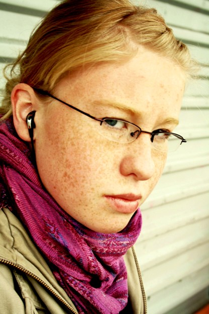 Just a girl waiting for a bus
