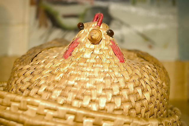 Who doesn't need a wicker bun server with rooster lid?